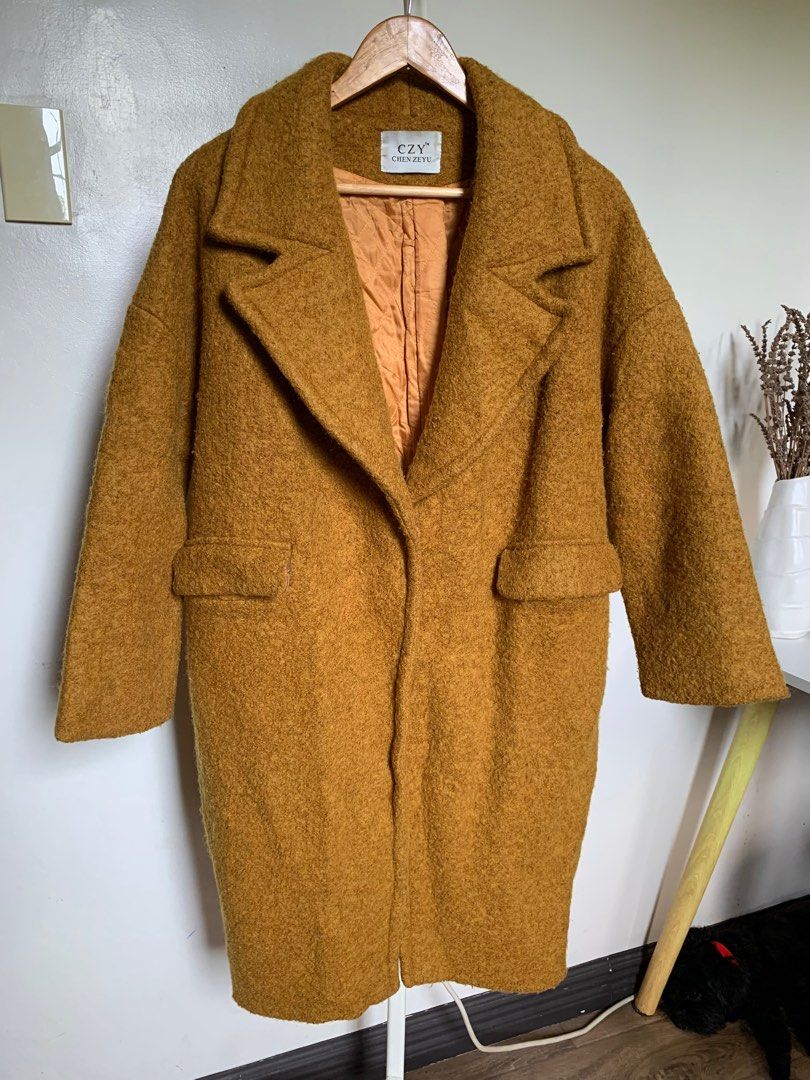 Mustard Yellow Winter Wool Coat (Category: Coats, Jackets and Outerwear) located in Caloocan City. Submitted by hellodeco (Listing ID 1254680145, Image 1). Description: Mustard Yellow Winter Wool Coat Love this color so much! Heavy coat Size: S - XL Flaws: may onting himulmol but unnoticeable naman. Can also be removed. First button, easily unbuttoned. RFS. Decluttering. Needs space for the new ones..