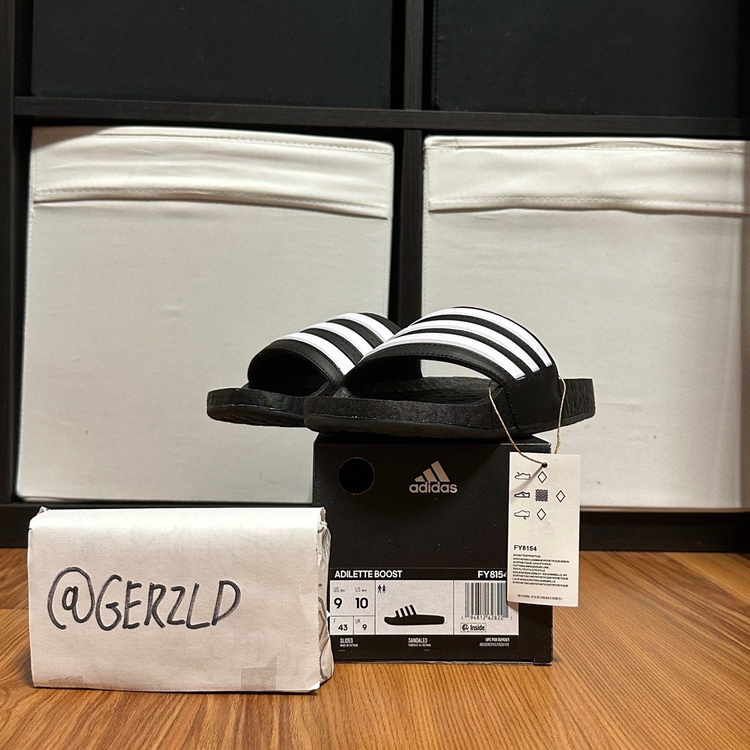 UNDER RETAIL] Adilette Boost Slides, Men's Fashion, Footwear, Flipflops and  Slides on Carousell