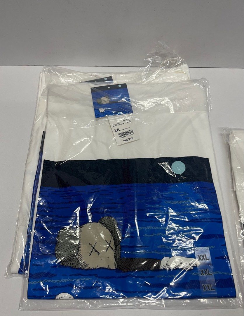 Uniqlo x Kaws Blue | XL | (Category: Tshirts & Polo Shirts ) located in Quezon City. Submitted by helloqicks (Listing ID 1254801466, Image 2). Description: Extra 🔘UNIQLO X KAWS SHIRT 1 BLUE🔘 ➖XL ➖2XL ➖Brandnew 🏷️ Selling for 1,200 ✅ ORIGINAL. LEGIT. AUTHENTIC ✅ MONEY BACK IF PROVEN FAKE 🔴 Shipping: Metro Manila - Lalamove or Grab Provincial - GOGO Xpress 🔴 Location: Fairview, Quezon City 🔴 MOP: GCash / Maya / Grabpay / Paypal / Bank Transfe