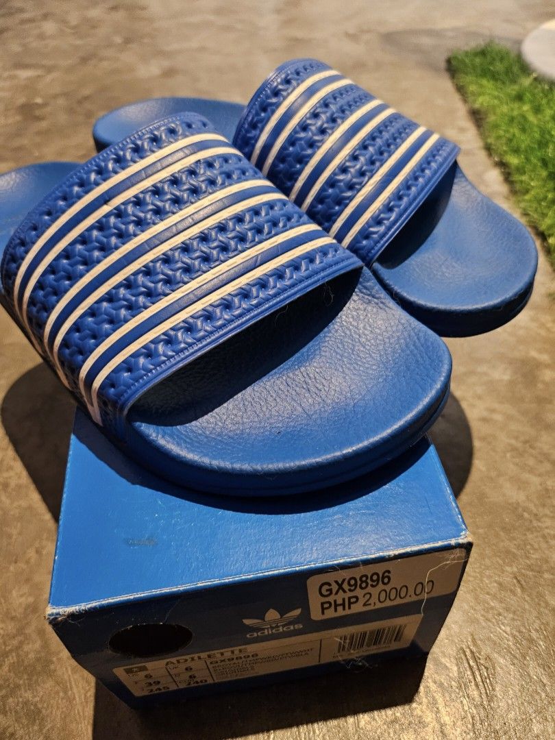 Addidas slides (Category: Slippers & Slides) located in Quezon City. Submitted by 123700000 (Listing ID 1254856653, Image 1). Description: adidas slides size 6 like new once used orig price: 2,000.