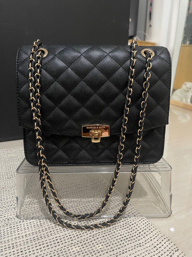 Black chain store strap bag