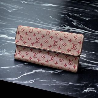 Louis Vuitton Blue Monogram MIni Lin Canvas Porte Tresor International  Wallet Louis Vuitton | The Luxury Closet