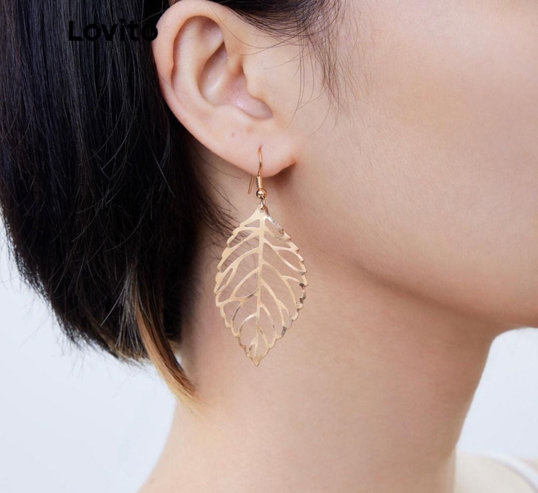 Gold coloured new arrivals drop earrings