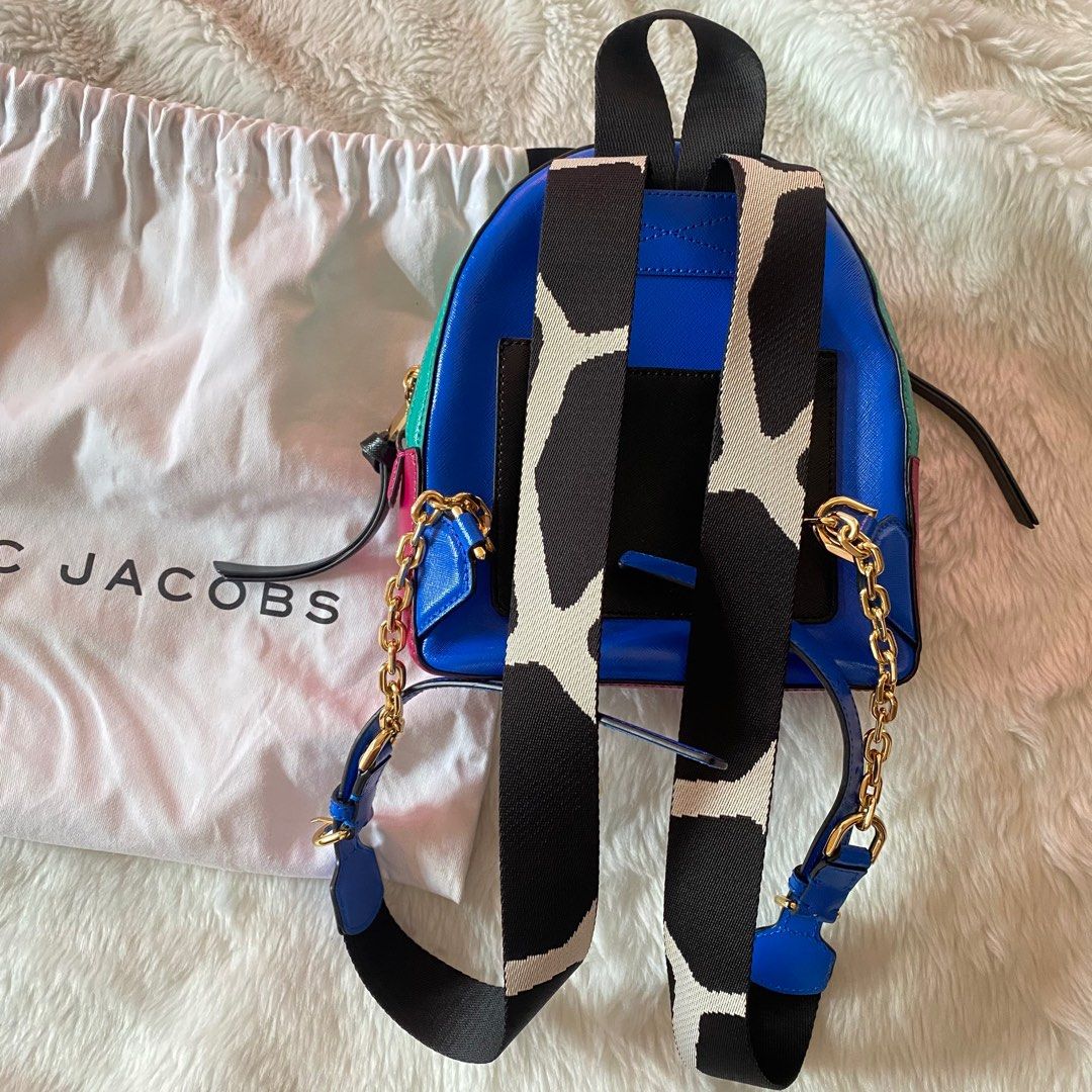 Marc Jacobs Colorblock Pack Shot Mini Backpack (Category: Luxury Bags & Wallets) located in Quezon City. Submitted by morespace555 (Listing ID 1254880387, Image 2). Description: Negotiable Good as new No scratches/marks/odor Just needs a bag filler to maintain the shape •Colorblock saffiano leather • Flat canvas top handle, 3" drop • Adjustable shoulder straps, 16" drop • Gold-tone hardware • Exterior rear compartment • Zipper closures • Dual com