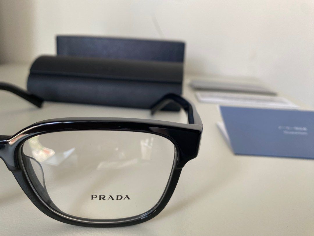 Prada glasses / spectacles / frames (Category: Sunglasses & Eyewear) located in Singapore. Submitted by come2mama (Listing ID 1254897129, Image 10). Description: Brand new Prada classic italian look (size 55) Selling because i bought it thinking i have lost my old spectacles, but found it shortly after Purchased for $380.
