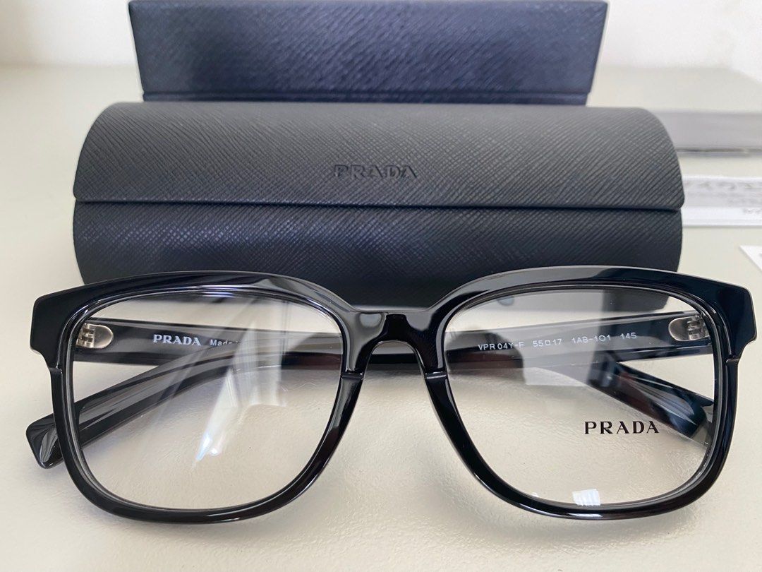 Prada glasses / spectacles / frames (Category: Sunglasses & Eyewear) located in Singapore. Submitted by come2mama (Listing ID 1254897129, Image 1). Description: Brand new Prada classic italian look (size 55) Selling because i bought it thinking i have lost my old spectacles, but found it shortly after Purchased for $380.
