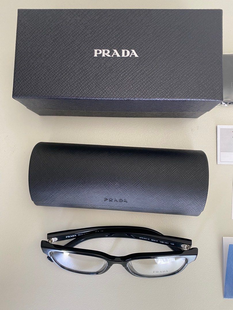 Prada glasses / spectacles / frames (Category: Sunglasses & Eyewear) located in Singapore. Submitted by come2mama (Listing ID 1254897129, Image 3). Description: Brand new Prada classic italian look (size 55) Selling because i bought it thinking i have lost my old spectacles, but found it shortly after Purchased for $380.