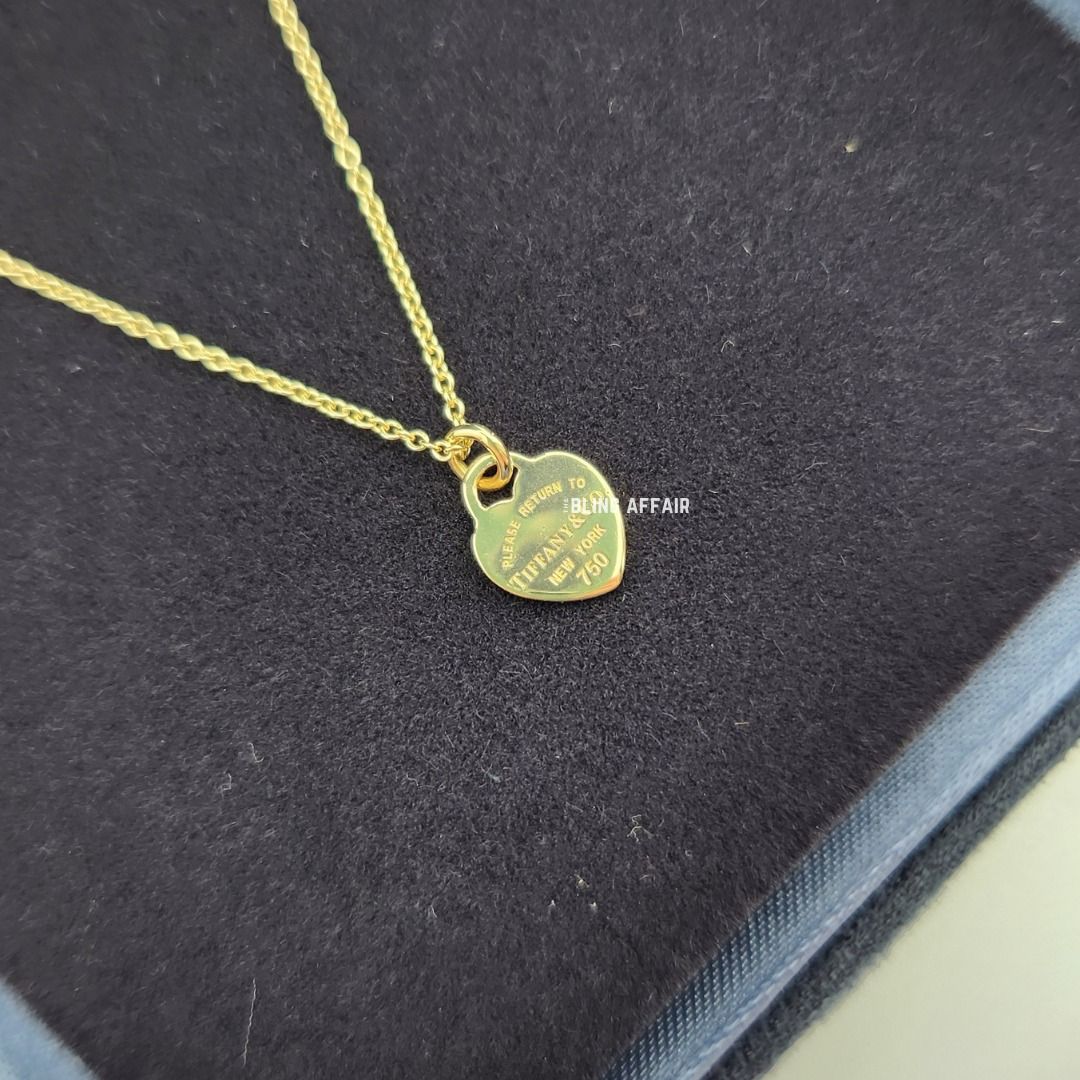 Gold heart outlet tag necklace