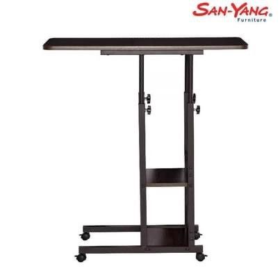 Study Table, Work Table, Bed Side Table, movable with shelves and storage space (Category: Tables & Sets) located in Caloocan City. Submitted by prelovedbyjkg (Listing ID 1254831473, Image 3). Description: Highlights • Brand: San-Yang • San-Yang Laptop Table Adjustable 405009 • Size: 80 x 38 x 76 (LWH) • Materials: PVC and Particle Board • Color: Dark Walnut • Adjustable, has wheels with locks and adjustable table height • Has 2 accessible storag
