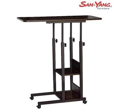 Study Table, Work Table, Bed Side Table, movable with shelves and storage space (Category: Tables & Sets) located in Caloocan City. Submitted by prelovedbyjkg (Listing ID 1254831473, Image 2). Description: Highlights • Brand: San-Yang • San-Yang Laptop Table Adjustable 405009 • Size: 80 x 38 x 76 (LWH) • Materials: PVC and Particle Board • Color: Dark Walnut • Adjustable, has wheels with locks and adjustable table height • Has 2 accessible storag