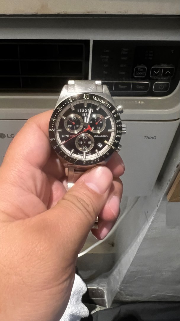 Tissot trinoma top