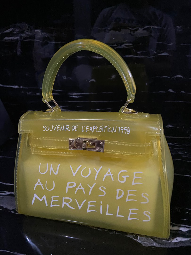 Un voyage bag yellow shop