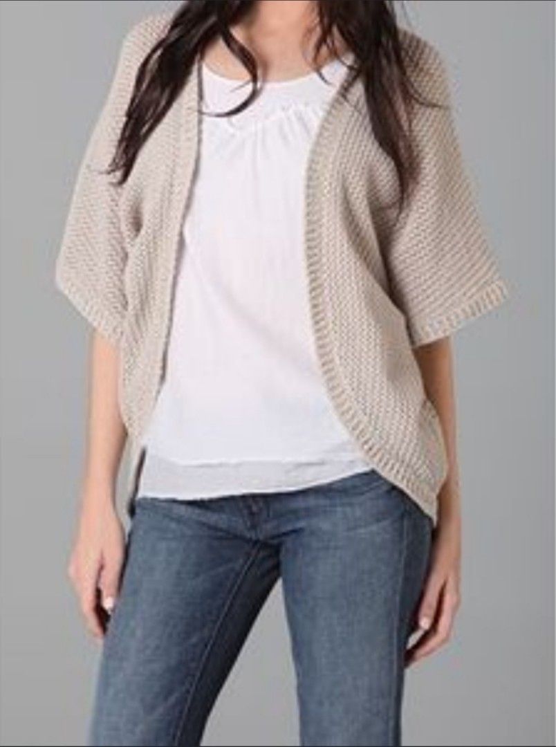 UNIQLO Beige Cardigan (Category: Coats, Jackets and Outerwear) located in Cebu City. Submitted by declutter_cebu (Listing ID 1254896477, Image 3). Description: UNIQLO Beige Short Sleeve Cardigan ( Medium) Used with care Best paired with denim shorts and white tube/spag straps **Some photos for reference only. RFS: declutter Refrain from Haggling please!.