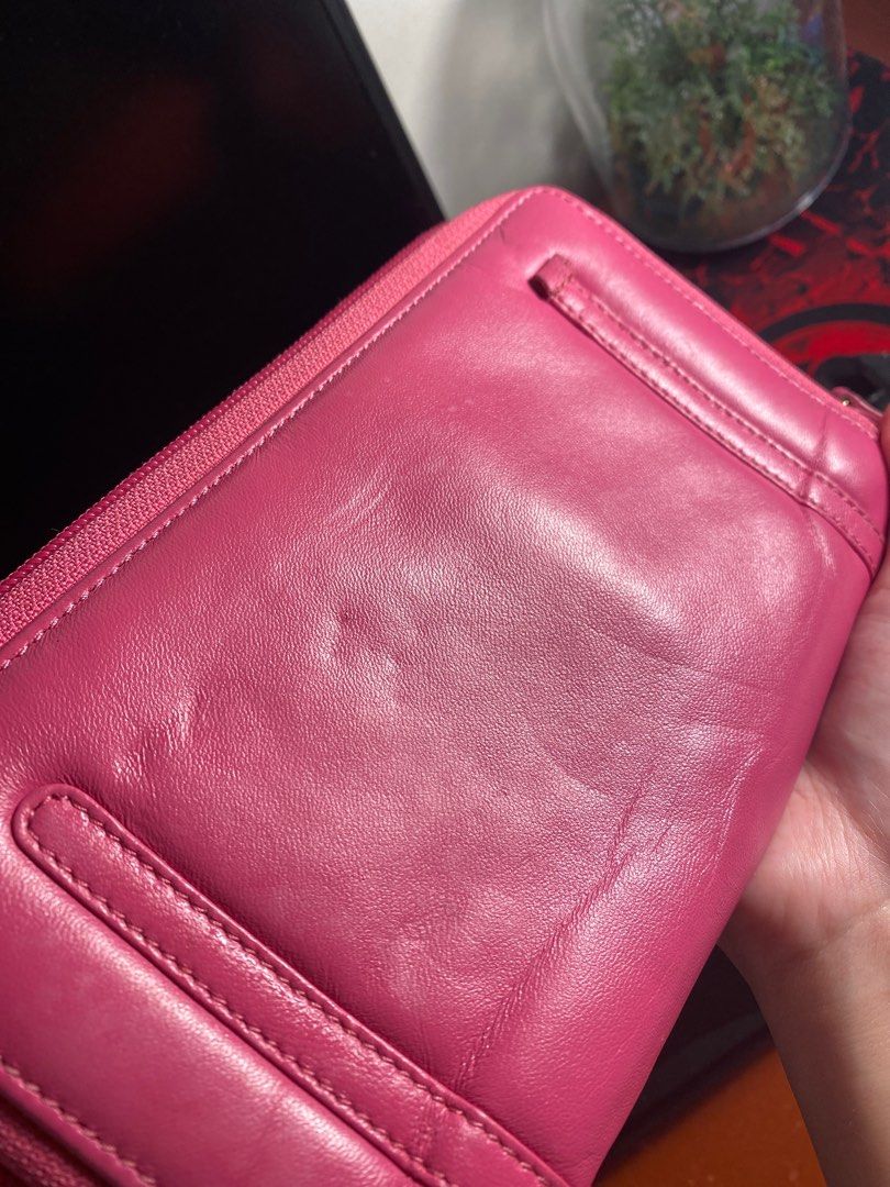 VIVIENNE WESTWOOD WALLET (Category: Luxury Bags & Wallets) located in Cavite. Submitted by lily_anik (Listing ID 1252674283, Image 3). Description: !! not sure if authentic !! never used this wallet but since there’s many signs of usage, i’m letting it go. (it came with a bag i bought from an IG shop) Please DM for more pics (preferably before you offer).