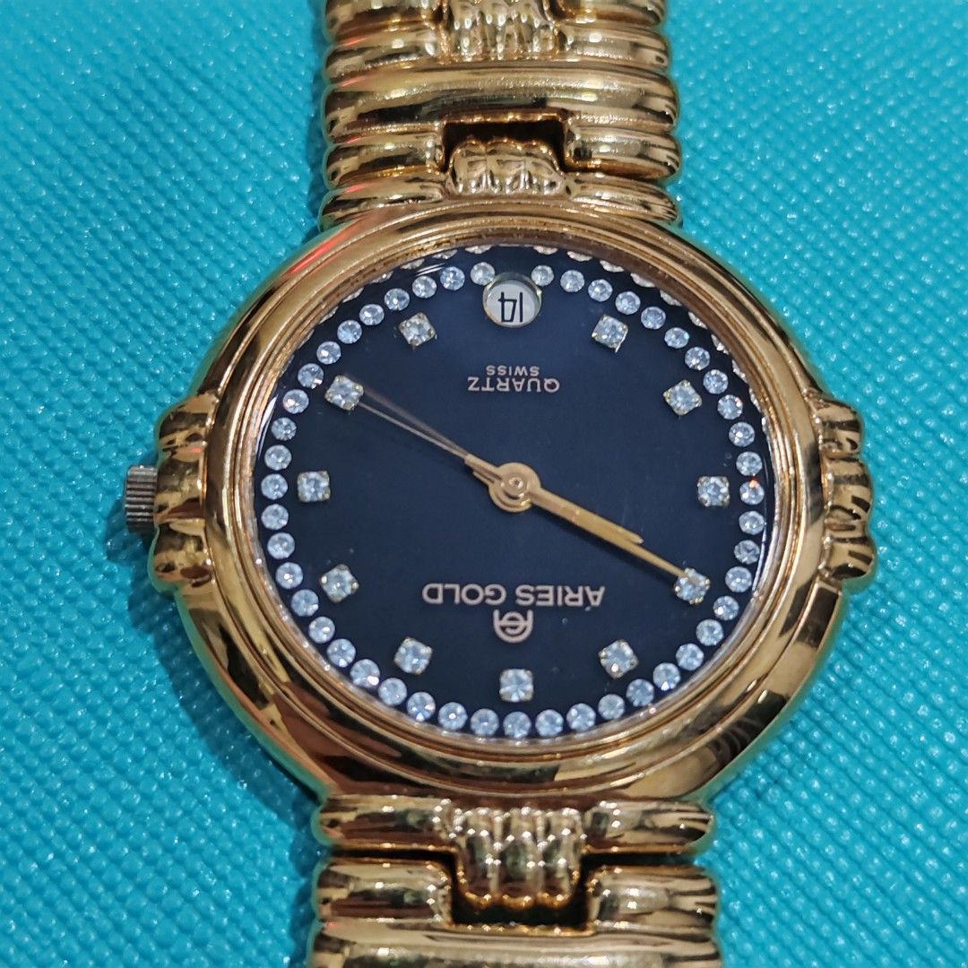 Aries gold watch sale