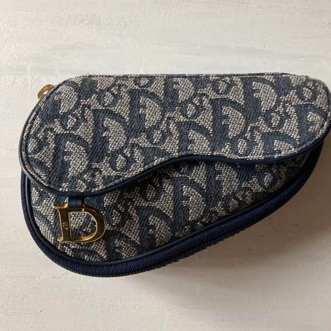 Dior vertical saddle pouch, Luxury, Bags & Wallets on Carousell