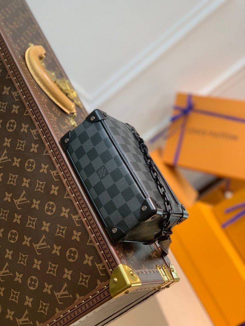 Louis Vuitton LV box clutch hard trunk, Men's Fashion, Bags, Sling Bags on  Carousell