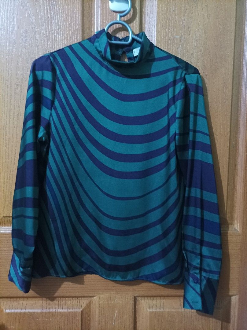 Mango Satin Top (Category: Blouses) located in Cebu City. Submitted by declutter_cebu (Listing ID 1255052031, Image 3). Description: Mango Satin Top (XSMALL) Used once Christmas 2022 Great to pair with a black skirt Shoulder to shoulder 14 inches Bust 18 inches Length 22.5 inches *Some photos for reference only. RFS: declutter Refrain from Haggling please!.
