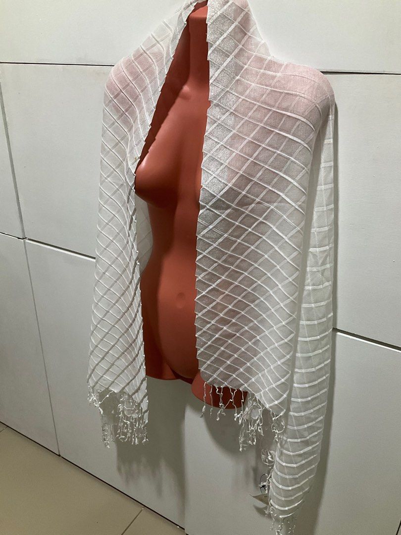 Scarf by et cetera (Category: Coats, Jackets and Outerwear) located in Bacoor. Submitted by shamraq (Listing ID 1255010677, Image 2). Description: White scarf/shawl with silver edge. Has small stains which can be removed when washed..