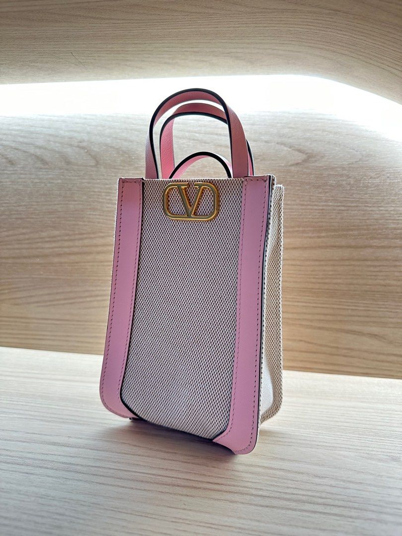 V Logo Signature Canvas Phone Pouch in Pink - Valentino Garavani
