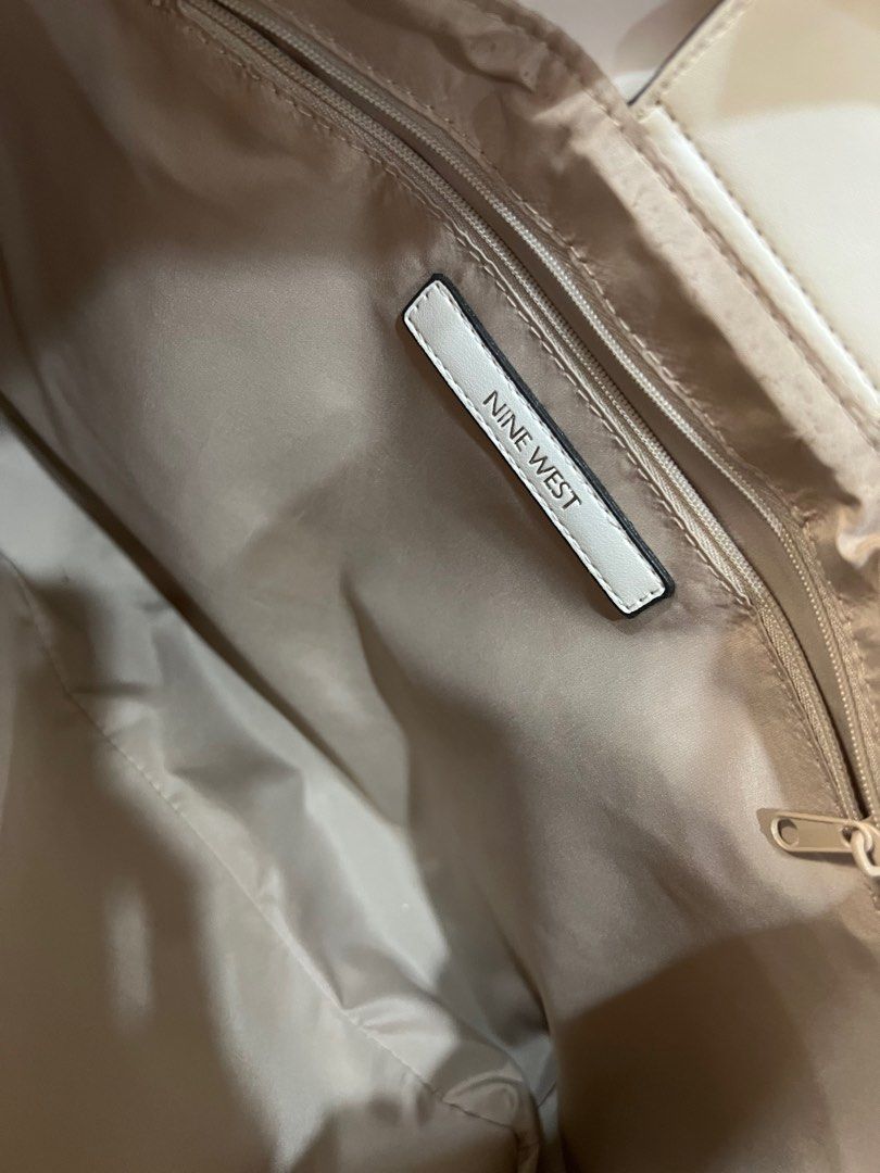 BNWT Nine West White Elegant Shoulder Bag (Category: Shoulder Bags) located in Quezon City. Submitted by cleanspaceph (Listing ID 1255207482, Image 3). Description: Brand New Authentic Nine West White Shoulder Bag bought in the US.