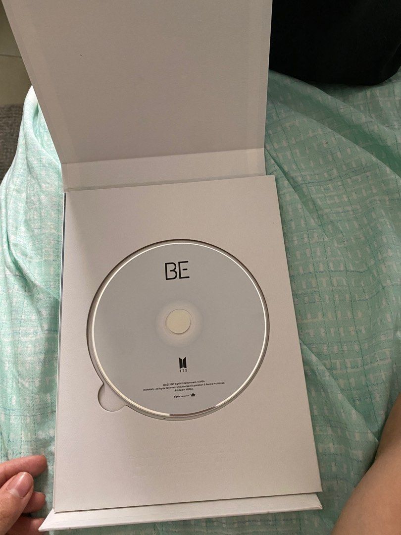 BTS BE Album (Category: CDs & DVDs) located in Taguig. Submitted by anmit (Listing ID 1255202691, Image 2). Description: Unused, only openedp.