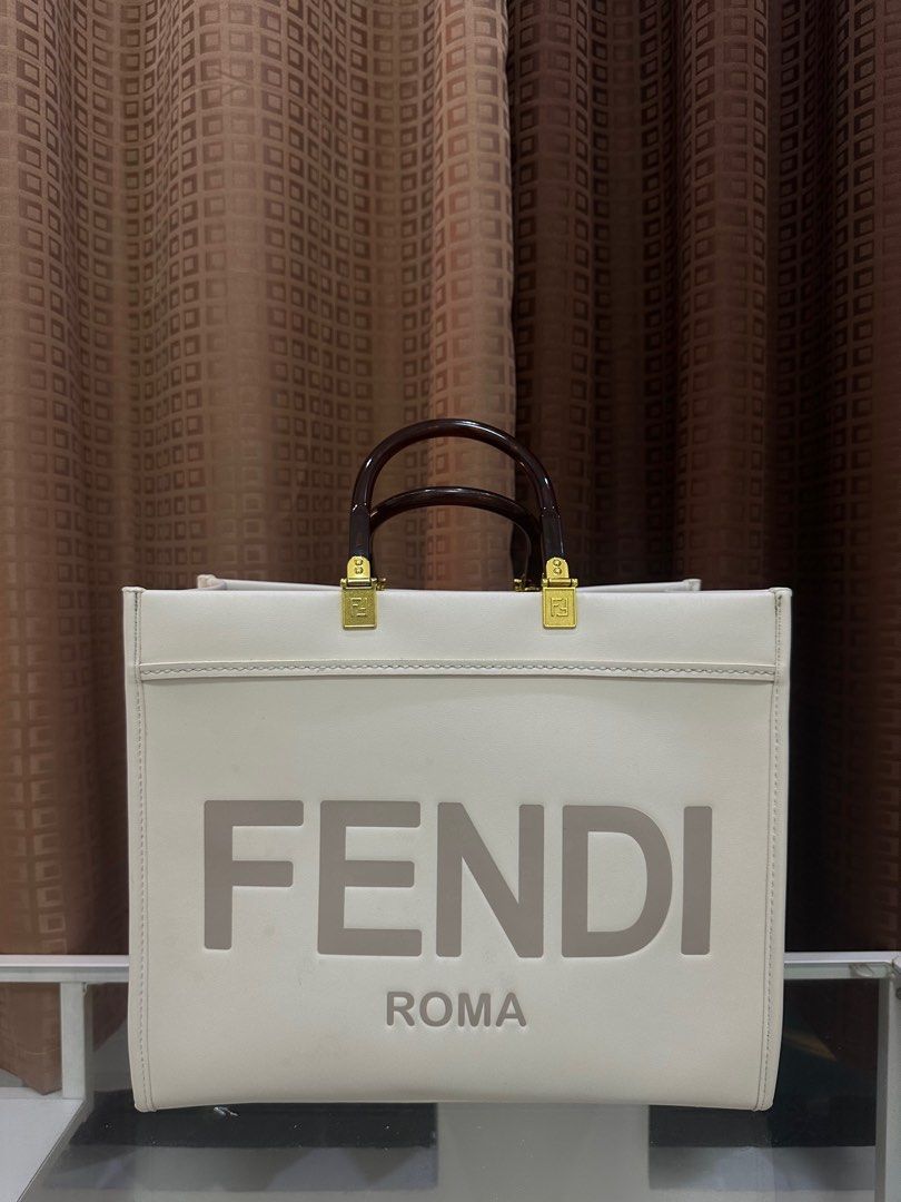 FENDI TOTE BAG (Category: Luxury Bags & Wallets) located in Caloocan City. Submitted by wiyana_aliah (Listing ID 1255229139, Image 1). Description: CODED ✔️ Not guaranteed authentic Perfect sa mga maraming gamit with long strap Issue: may minor watermarks lang no last price.