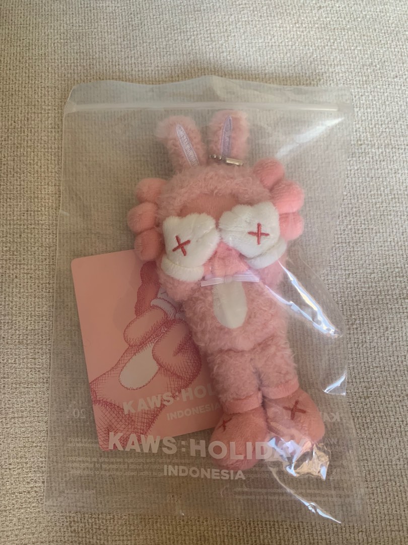 KAWS Holiday Indonesia Plush Charm pink-