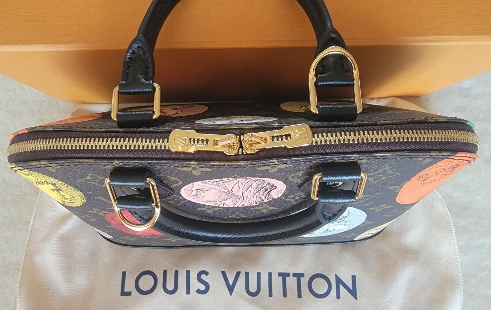 Louis Vuitton Monogram Alma BB Handbag in brown canvas