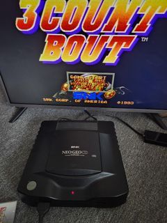 Neogeo cd console with 6 games