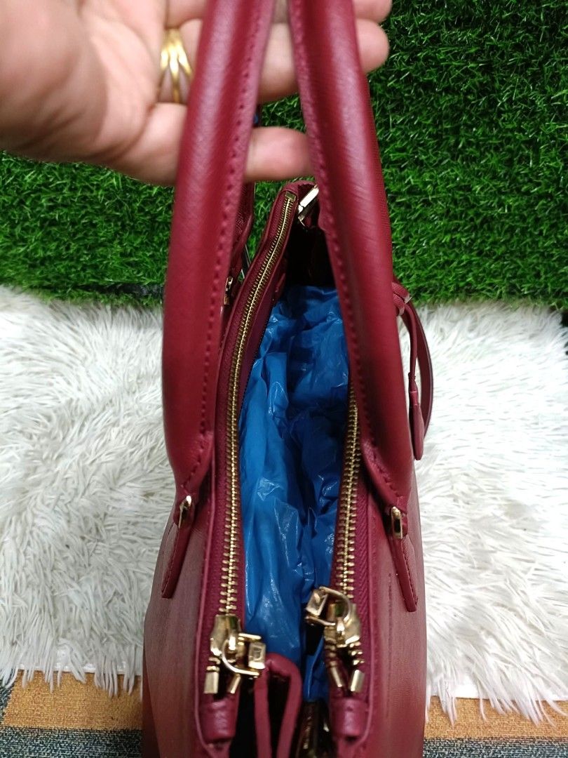 PRADA saffiano red box bag