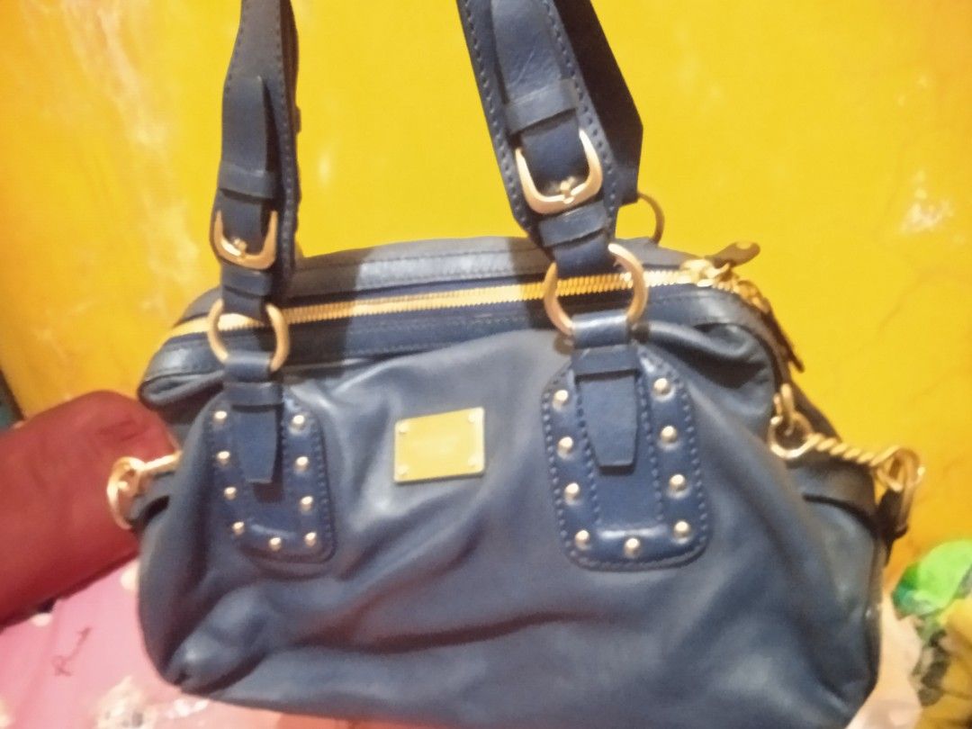 Preloved Vintage MK soft leather pebbled bag (Category: Luxury Bags & Wallets) located in Quezon City. Submitted by shine2031 (Listing ID 1255213353, Image 2). Description: Preloved Vintage MK soft leather pebbled bag given as a gift RFS: need funds with minimal flaw.