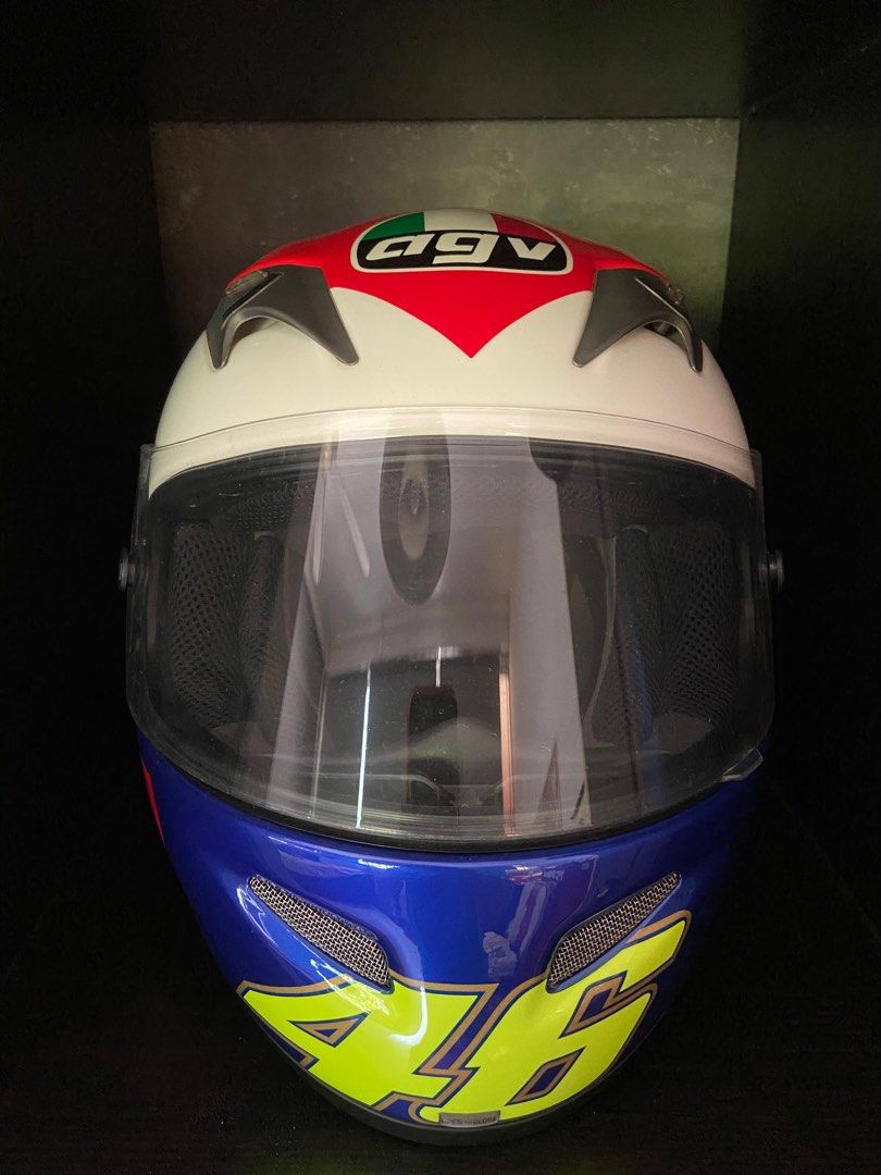Valentino Rossi AGV Limited Edition full face helmet Ti-tech Mugello Heart (Category: Motorcycle Accessories) located in Singapore. Submitted by keikoash (Listing ID 1255101629, Image 3). Description: VERY RARE FIND LIMITED EDITION No.2415 of 2500 Size: L (Same as Arai size M) Condition: No scratches on helmet Some stain on visor Clean cushions Ti-tech 1 letter came off, 1 coming off Strap lock is fine, no button lock.