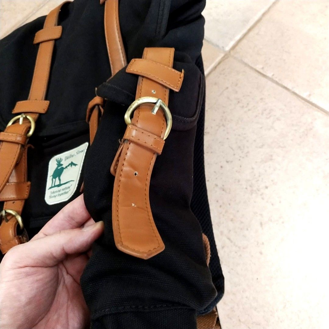 Leather straps multi compartment backpack Men s Fashion