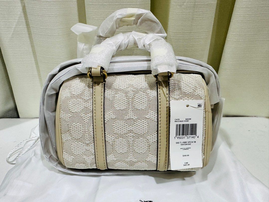 Authentic Coach Ruby 18 Signature Jacquard (Category: Luxury Bags & Wallets) located in Quezon City. Submitted by selinabu (Listing ID 1255579175, Image 2). Description: Brand new and still factory wrapped Can be carried as a handbag or use the long strap as crossbody It may look like a cutie but it will fit all essentials (short wallet, iphone, keys, hand cream, lipbalm, baby wipes, small pack of tissue, mint and keys) it’s quite compact! Super 