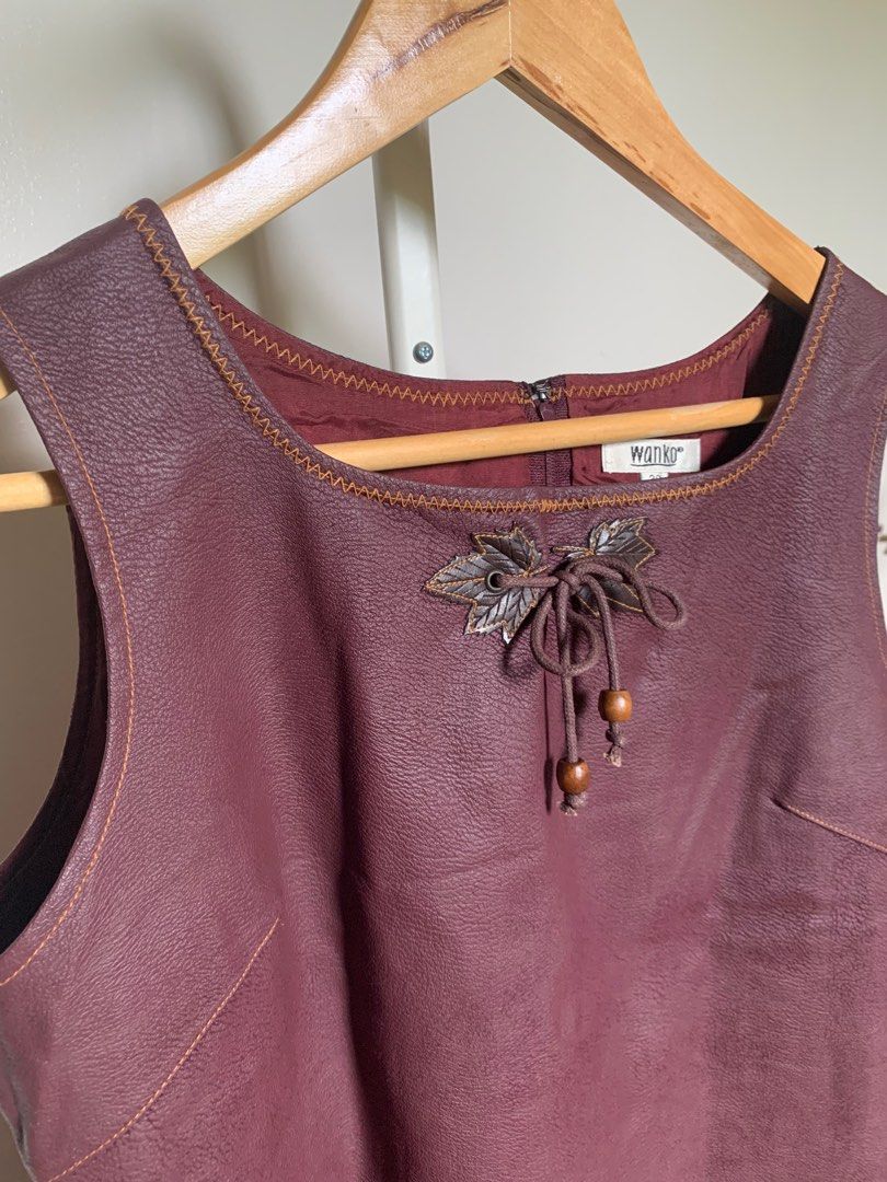 Burgundy Leatherette Dress (Category: Dresses) located in Caloocan City. Submitted by hellodeco (Listing ID 1255447511, Image 3). Description: Burgundy Leatherette Dress Closure at the back S: Medium Bust: 36” Waist: 33” Length: 33.5”.