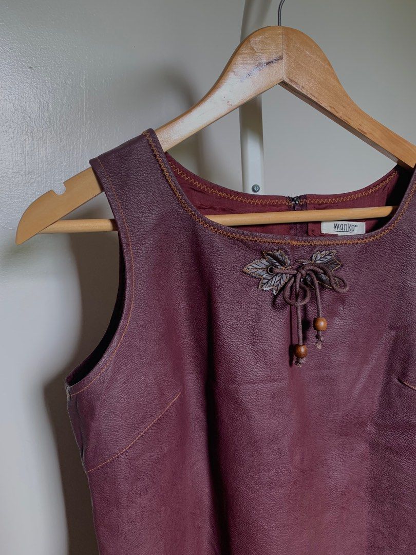 Burgundy Leatherette Dress (Category: Dresses) located in Caloocan City. Submitted by hellodeco (Listing ID 1255447511, Image 2). Description: Burgundy Leatherette Dress Closure at the back S: Medium Bust: 36” Waist: 33” Length: 33.5”.