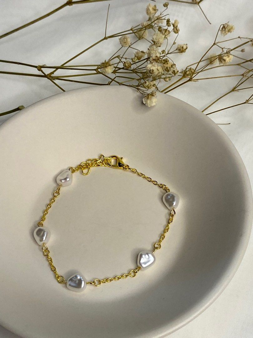 Gold pearl bracelet on sale designs