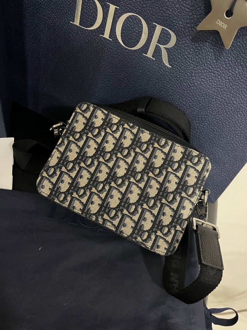 Authentic Dior Oblique Jacquard Vertical Lock Pouch with Strap, Luxury, Bags  & Wallets on Carousell