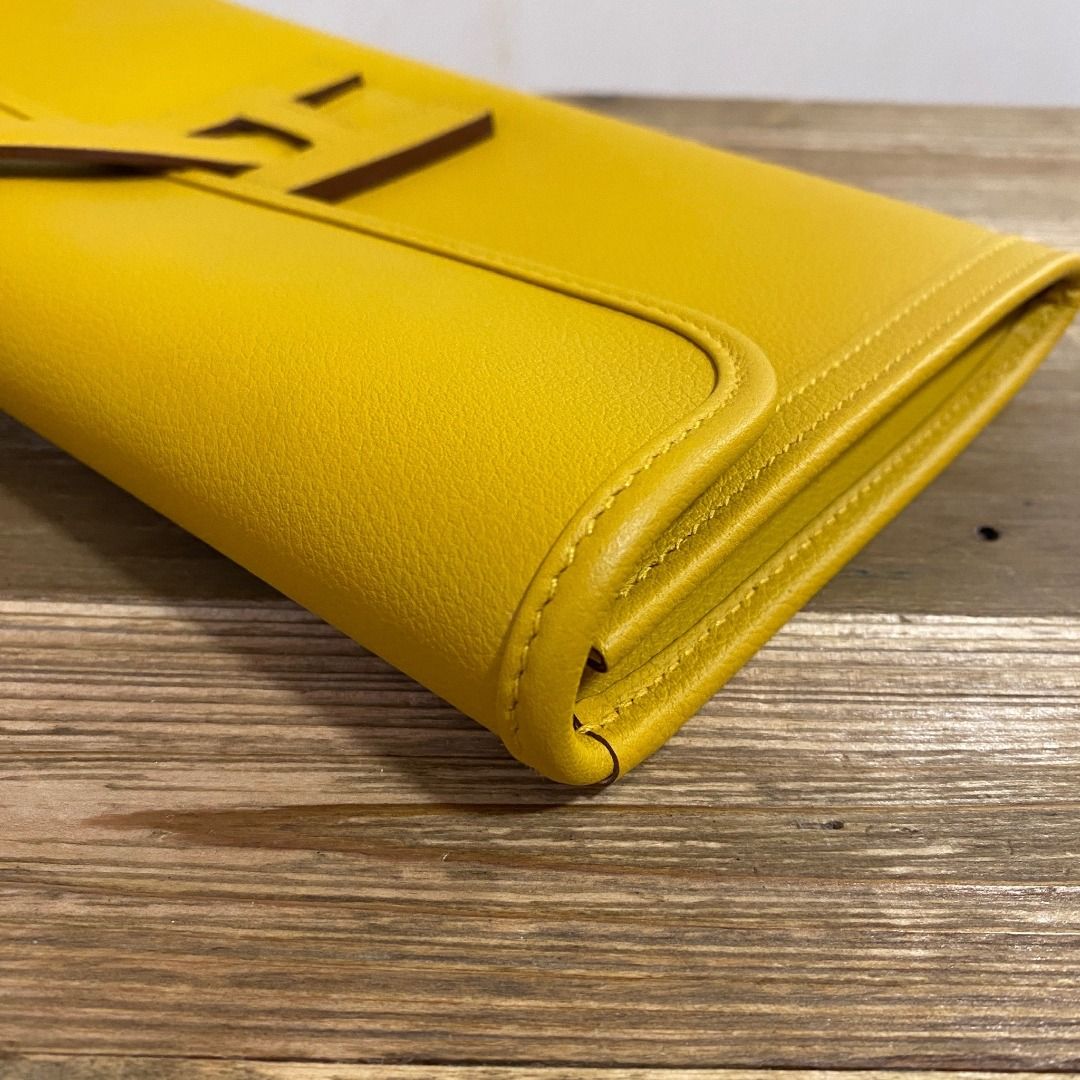 Hermes Jige Clutch in evercolor jaune ambre yellow in stamp c