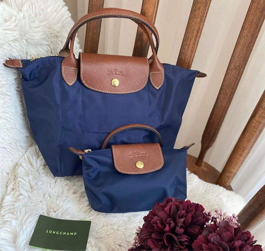Longchamp Classic Short handle (Category: Luxury Bags & Wallets) located in Taguig. Submitted by lux.mariah (Listing ID 1255414958, Image 2). Description: 💯 auth free shipping (j&t) Complete inclusions Trending university bag 🤍 Courier: Lalamove & J&T All colors available dm for more photos! If bundle, 9k only.