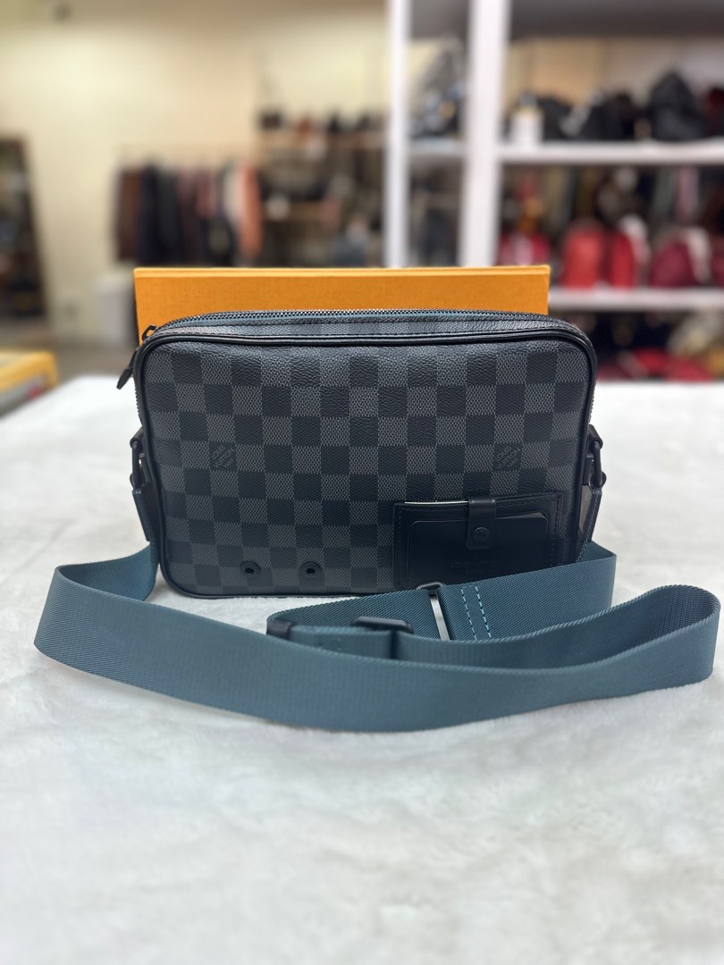 Louis Vuitton alpha messenger bag. Ordered this about 2 weeks ago and got  it in today about 10 hours early (shipped with epacket) only 3 very small  flaws that I ended up