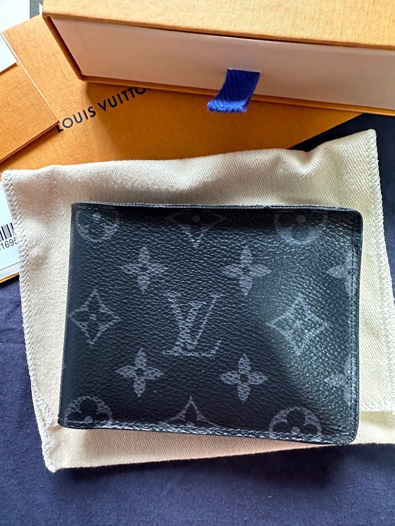 LV Multiple Wallet Eclipse Monogram (Category: Bags & Wallets) located in Singapore. Submitted by selin (Listing ID 1255432516, Image 3). Description: LV Multiple Wallet Eclipse Monogram - Daily Use of wear and tear sign on bill compartment leather. - Outlook is nicely - Frequently maintain with leather cream. - Bought at 2017, ION - Box, Dustbag, all will be provide. * Receipt for reference only (private details can’t give).