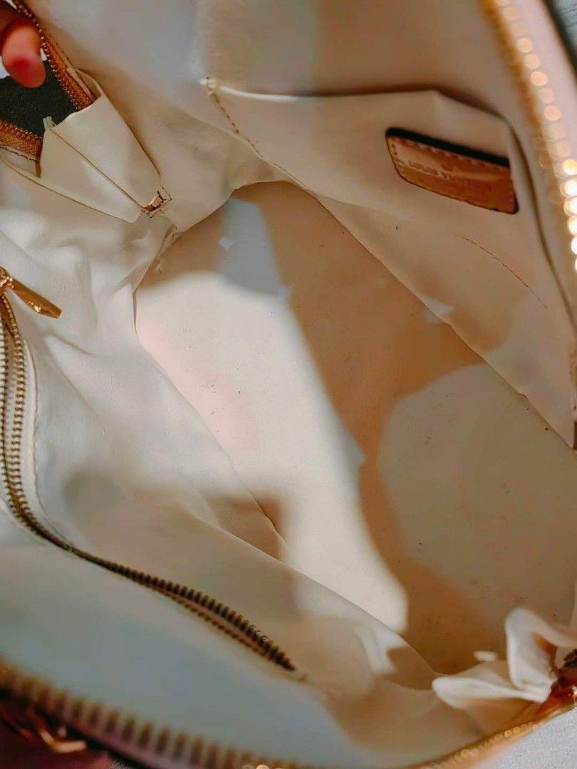 Preloved Lv Alma Patent bag (Category: Luxury Bags & Wallets) located in Cebu City. Submitted by day.98 (Listing ID 1255575714, Image 3). Description: from USA patent leather 30 cm two-way bag no flaws.