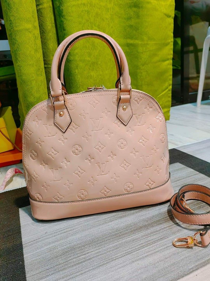 Preloved Lv Alma Patent bag (Category: Luxury Bags & Wallets) located in Cebu City. Submitted by day.98 (Listing ID 1255575714, Image 1). Description: from USA patent leather 30 cm two-way bag no flaws.