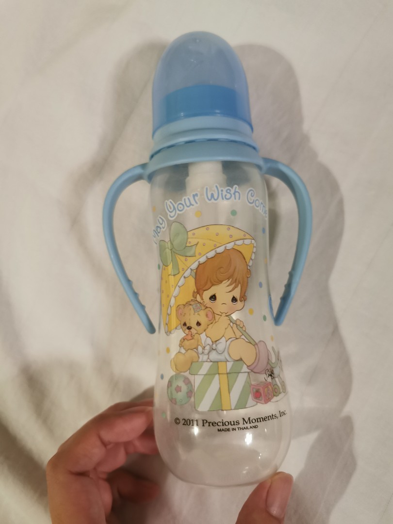 Previous moments bottle with holder, Babies & Kids, Nursing & Feeding