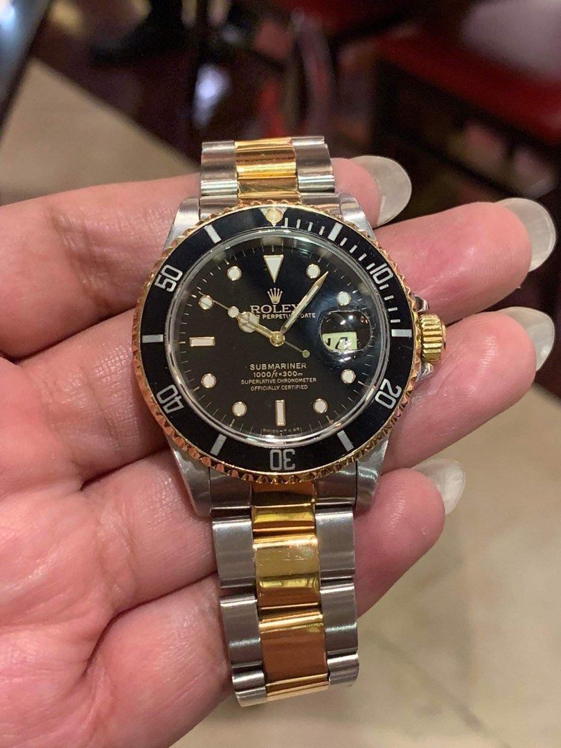 ROLEX 1995 Submariner Date two toned (Category: Luxury Watches) located in Pasig City. Submitted by Watchaholics (Listing ID 1255427544, Image 2). Description: ROLEX 1995 Submariner Date two toned model 16613 Year model 1995 9/10 condition Complete links Never been repaired UNIT ONLY With ROLEX pouch Open for verification For 599k You may DM or contact @ 09615077138 Thanks admin😉.