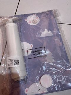 Vacum plastik baju untuk traveling
