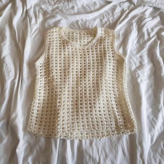 white crochet vest