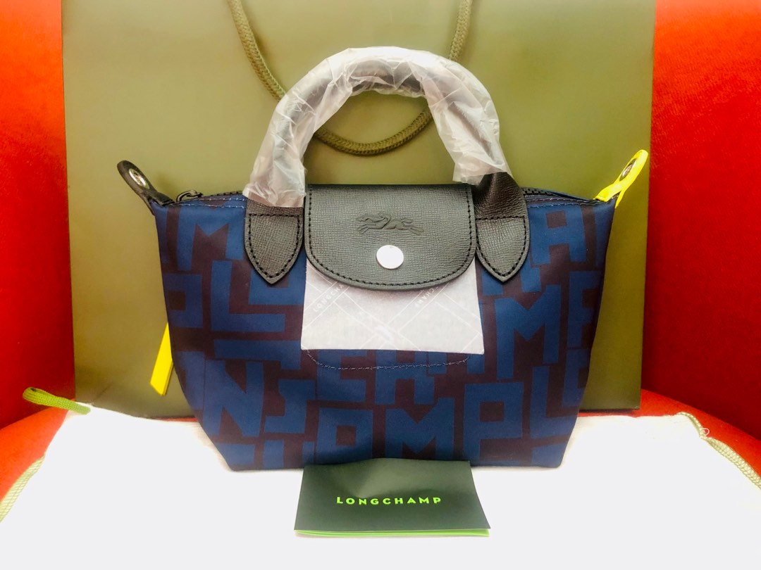 Limited Edition) Longchamp Le Pliage Striped Pouch, Luxury, Bags & Wallets  on Carousell